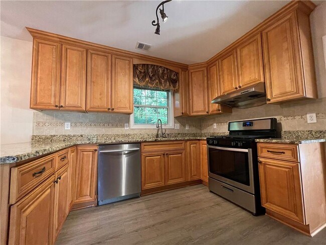 Building Photo - 2665 Woodbine Hill Way