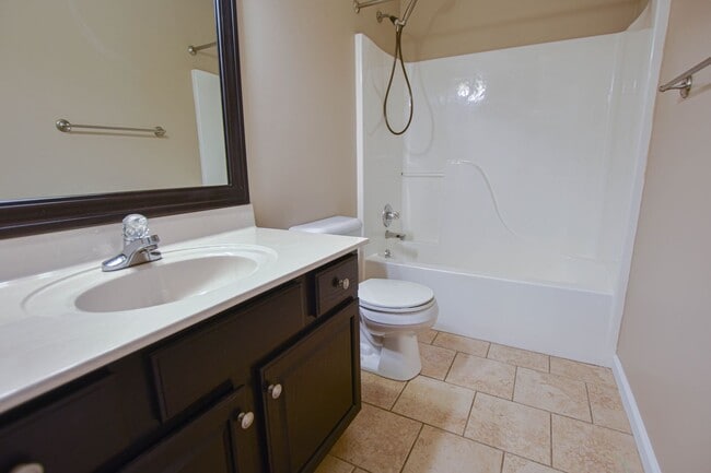 Building Photo - Pet Friendly Three Bedroom with Bonus!