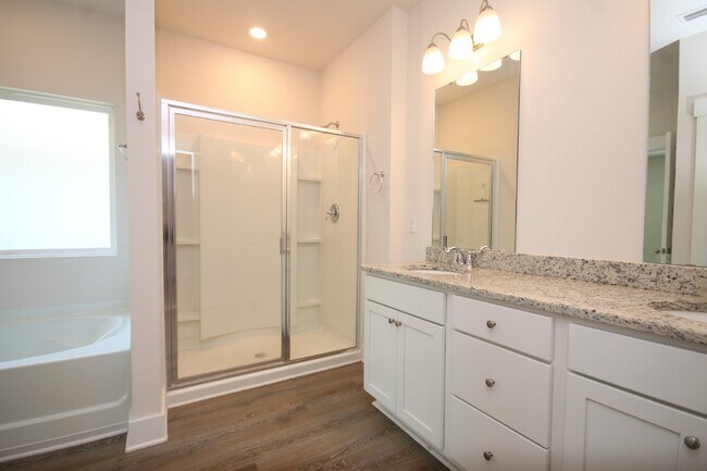 Building Photo - Stunning Modern 4-Bed, 2-Bath Home in Arbor Ridge – High Ceilings, Open Floor Plan, Granite Kitch...