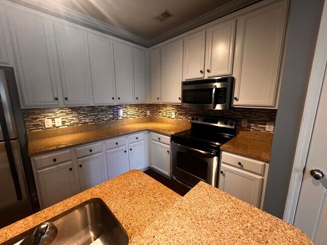 Building Photo - Now Available! Luxury three-bedroom townhome in St. James Square in Myrtle Beach.