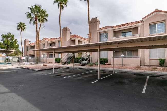 Building Photo - Charming Second-Floor Condo with Two Bedrooms and Fireplace