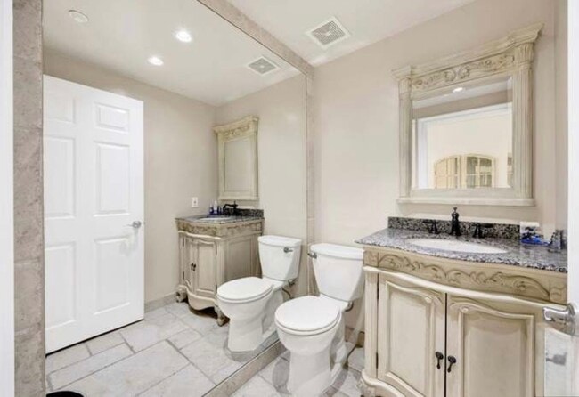 Powder bathroom - 11952 Montana Ave