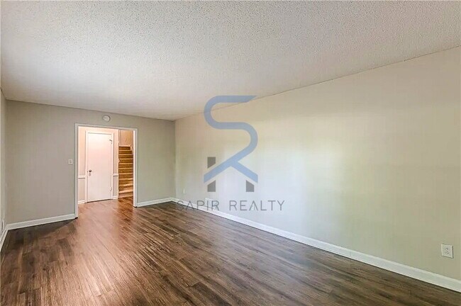 Building Photo - Move in before December 31st and choose your reward: a $250 Amazon Gift Card or a 55" Smart TV!