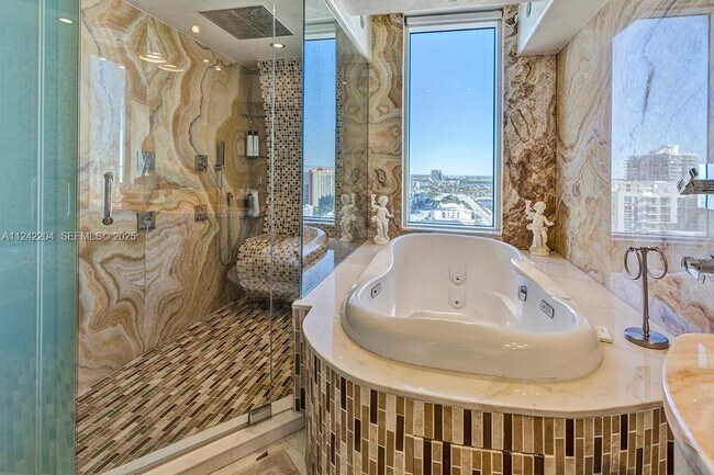 Building Photo - 16699 Collins Ave