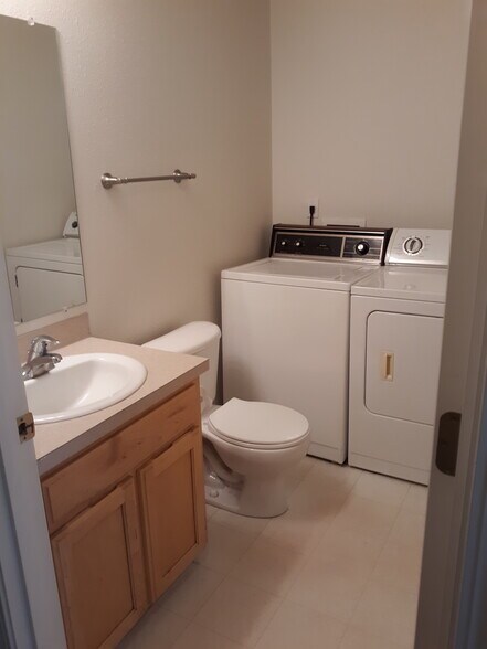 Half Bath and Laundry - 1458 Falcon Loop
