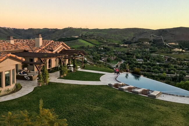rear patio area around pool - 13368 Orions Flight Way