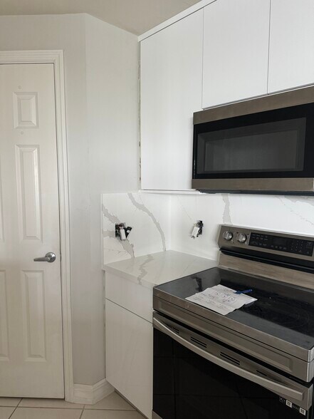 Kitchen and pantry, new oven and microwave - 2743 1st St