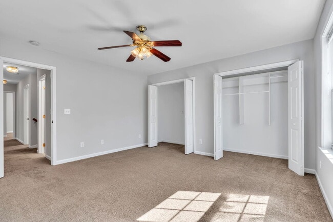 Building Photo - Beautifully Appointed 4BR Home Featuring a Screened Porch, Spacious Living Areas & Community Pool...