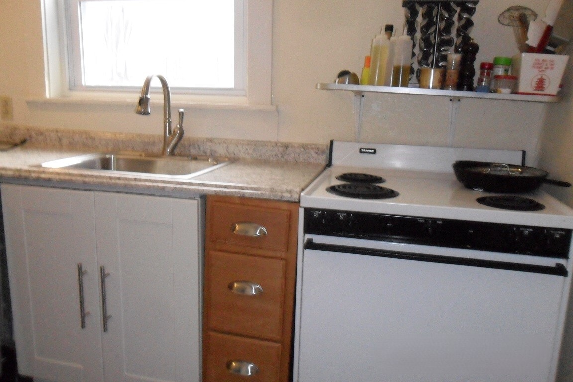 Kitchen - new faucet - 210 N Geneva St