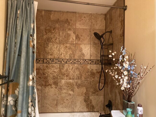 Itanian porcelian tile guest bathroom - 14217 55th Ave SE