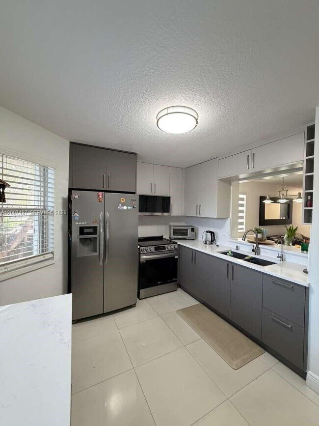 Building Photo - 7265 NW 173rd Dr