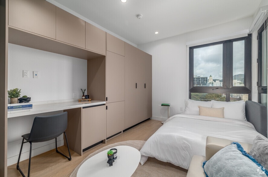 4BR, 4BA - 1,110SF - Bedroom - Miles at Highland CoLiving