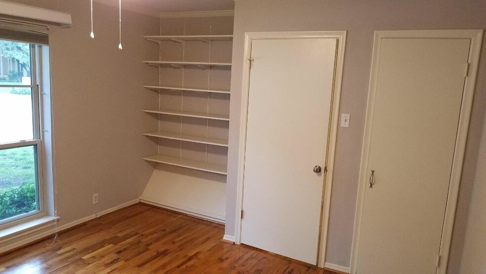 2nd bedroom bookshelves - 8518 Baltimore Dr