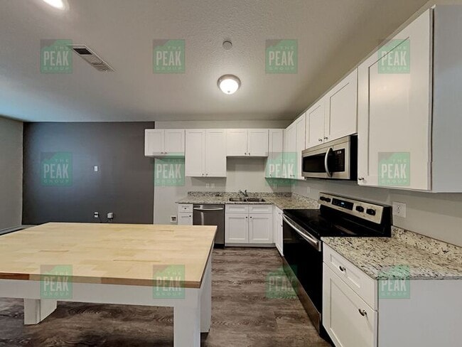 Building Photo - Move-In Special + WAIVED $300.00 ADMIN FEE!