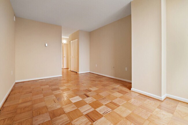 Building Photo - Spacious, and Sunlit 1 BD/1 BA Condo w/Reserved Garage Parking and Utilities Included in Chevy Ch...