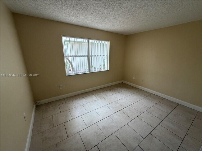 Building Photo - 4235 N University Dr