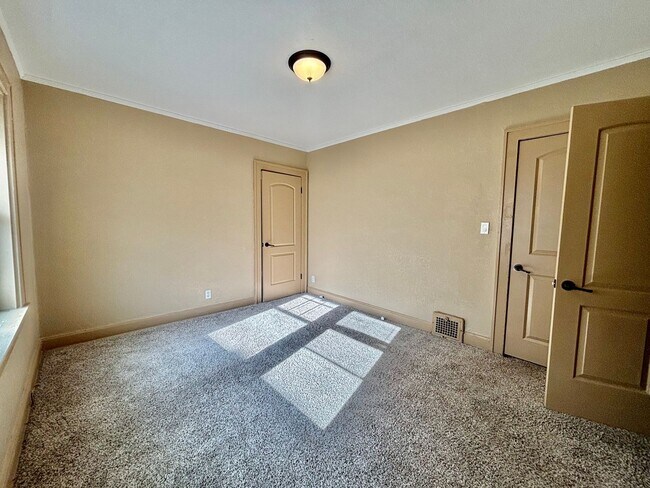 Building Photo - Spacious 2-Bedroom + Den Home with Ample Parking & Backyard!