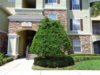 Building Photo - 10205 Courtney Palms Blvd