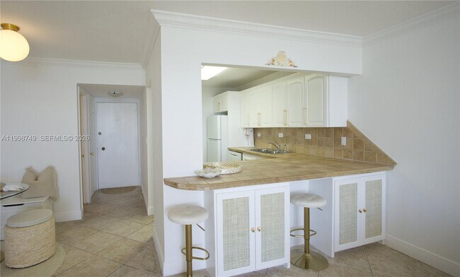 Building Photo - 5555 Collins Ave