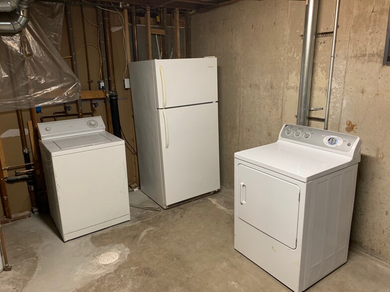 Laundry room in basement - 13613 E Nevada Pl