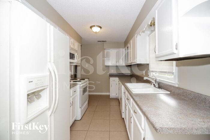 Building Photo - 4516 Leatherwood Ave