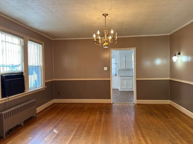 Building Photo - Welcome to our cozy 1st floor 2-bedroom, 1...