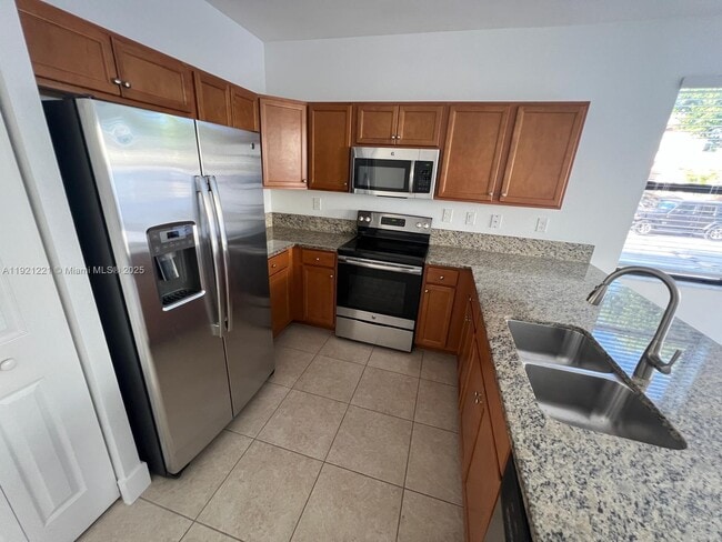 Building Photo - 9399 W 33rd Ln