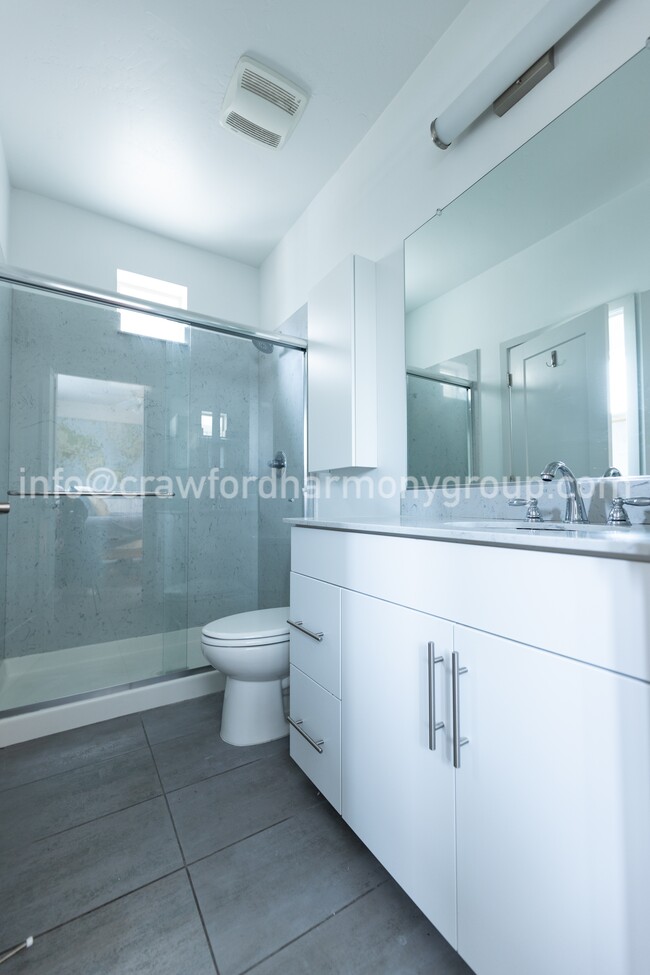 Bathroom located off primary bedroom provides optimal privacy. - 459 Lug Ln