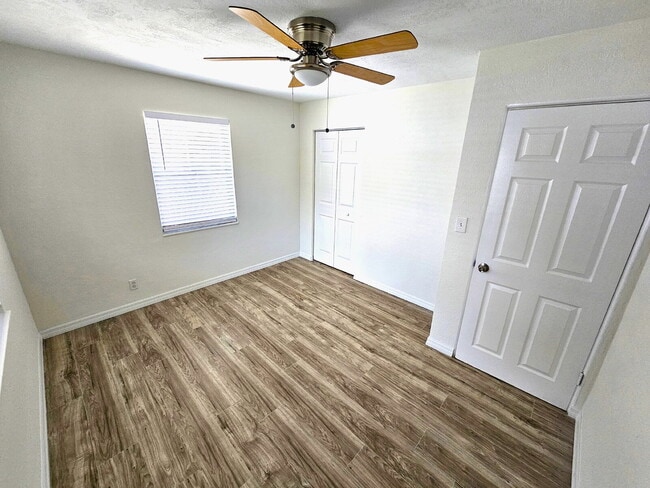 Building Photo - fully renovated 2-bedroom, 1-bathroom home with bonus guest room or office and oversized fenced yard