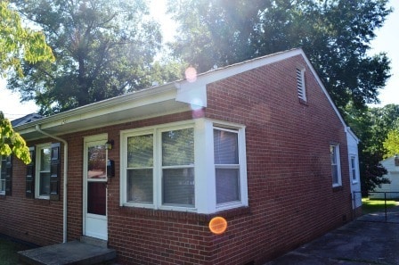 Building Photo - 3 BR/ 1 BA Lakeside Three bedroom with large fenced yard and detached garage/workshop