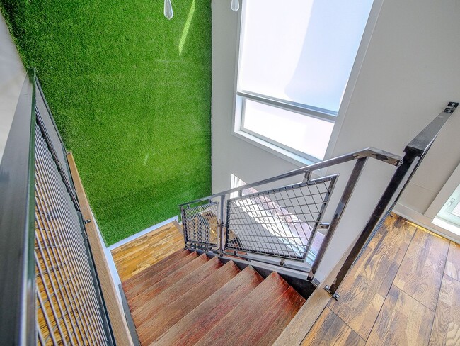 Building Photo - Three Bedroom Modern Olde Kensington Condo with Roofdeck