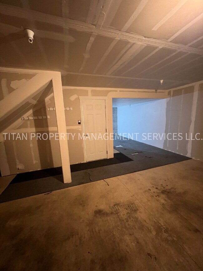 Building Photo - Beautiful Three Story Townhouse with Gas Fireplace, Balcony & 2-Car Garage