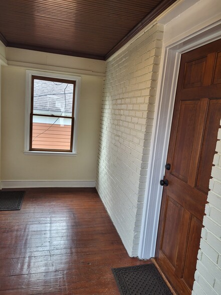 Secure porch storage for one bike - 250 5th St NE