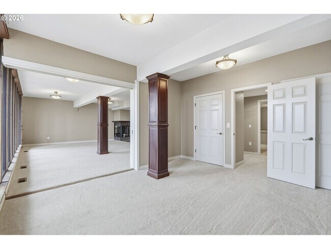 Building Photo - One-of-a-Kind 5BR Home with Floor-to-Ceiling Windows, Wraparound Decks & Breathtaking Treeline Views