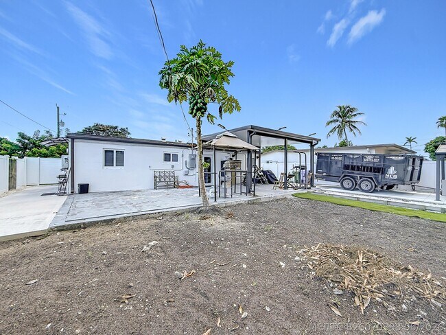 Building Photo - 6135 NW 24th Ct