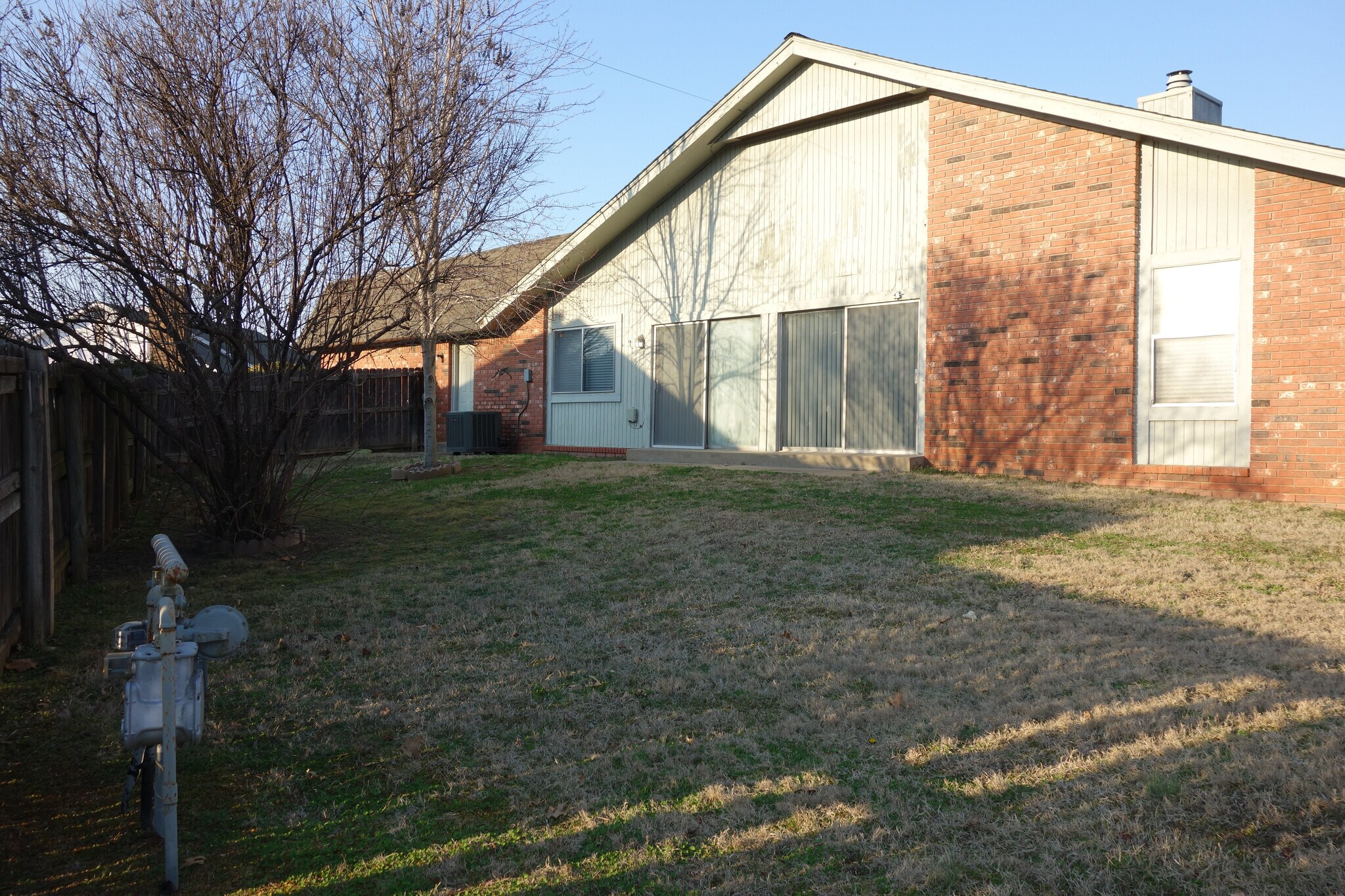 Final backyard view. Sliding door access from Kitchen and Living room - 3324 E 73rd St