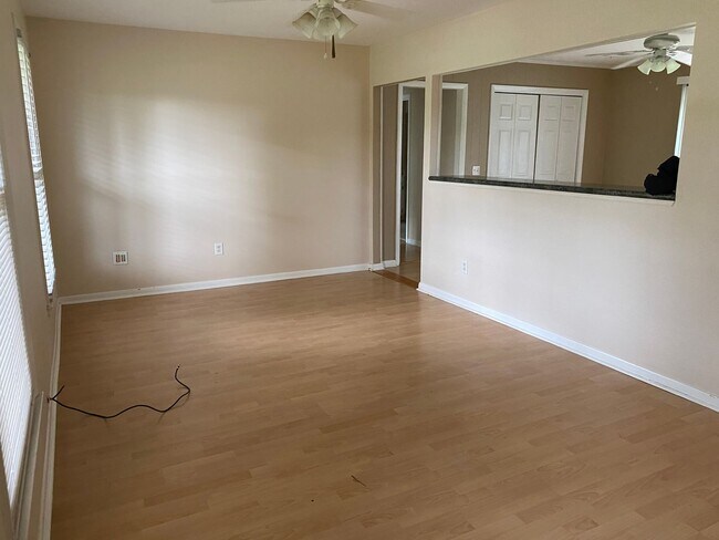 Building Photo - COMING SOON! 4Br, 2.5 baths, large kitchen, large bedrooms, fence, storage and more! N. College R...