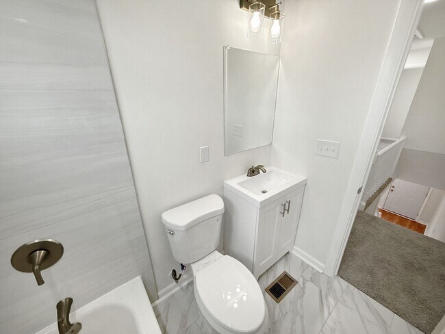 Building Photo - Spacious 3BR Home with Finished Basement & Flex Space