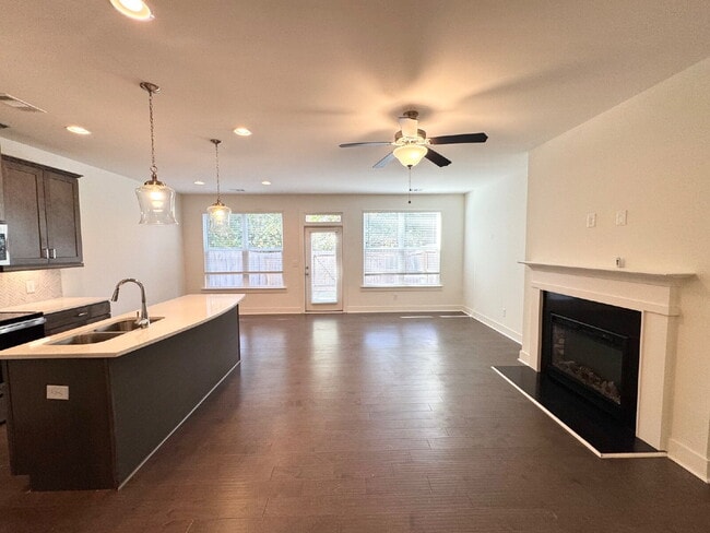 Building Photo - Stylish 3BR Townhome with Private Yard & T...