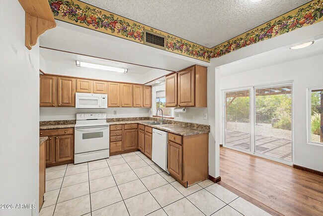 Building Photo - 9847 W Wrangler Dr