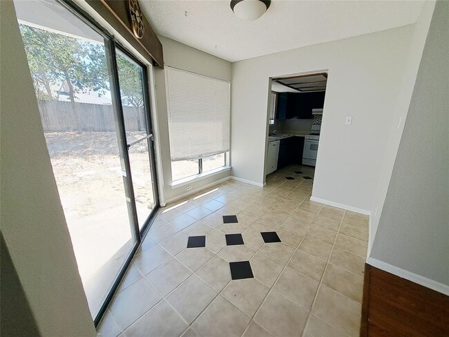 Building Photo - 9009 Sanger Dr