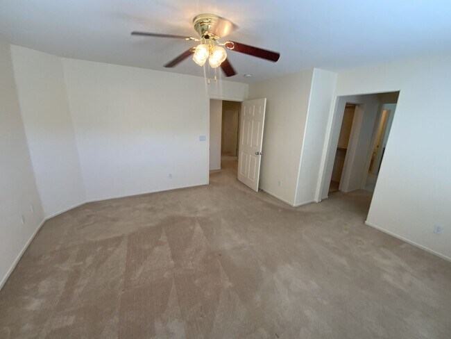 Building Photo - 4 bedrooms and 2.5 bathrooms 2-story home located in Henderson, NV!