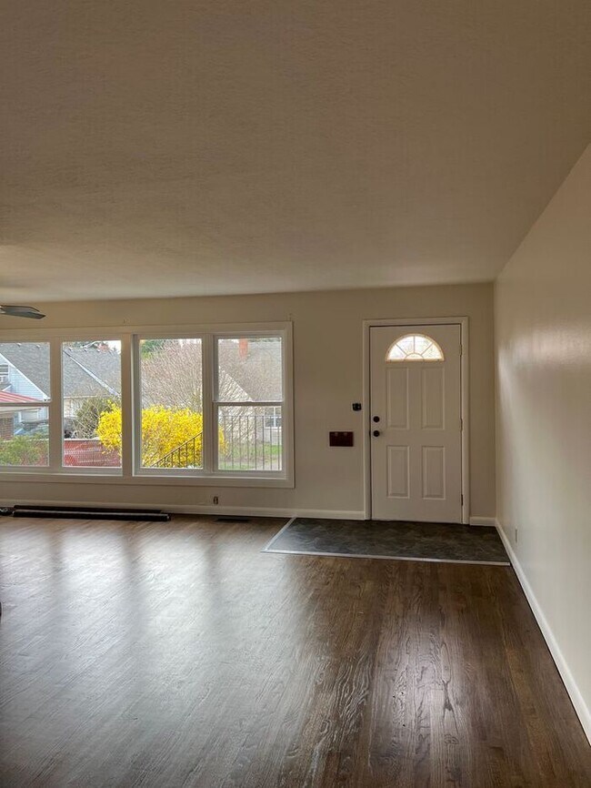 Building Photo - Your Mt. Tabor Oasis: Huge Yard, Oversized Shop-Garage & Sun-Drenched Living!