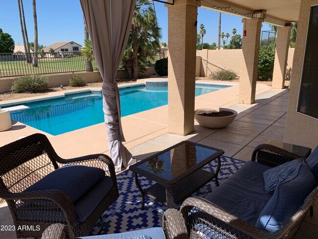 Building Photo - 6283 W Lone Cactus Dr