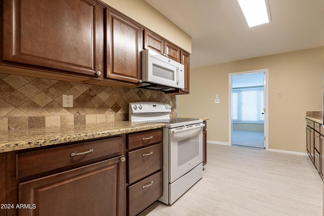 Building Photo - 12208 N Pebble Beach Dr