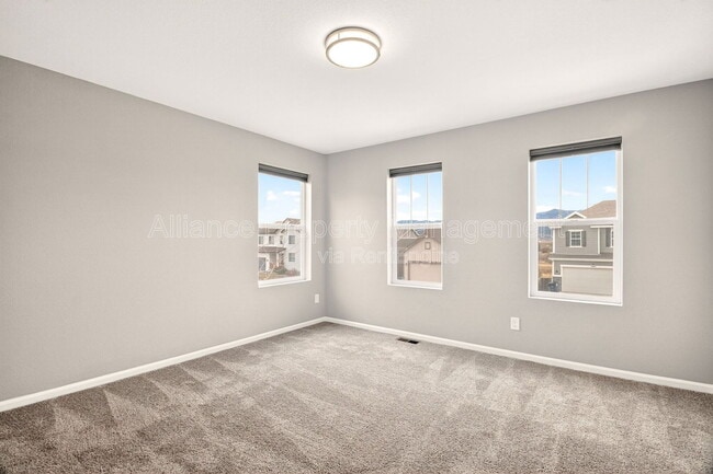 Building Photo - 7108 Passing Sky Dr