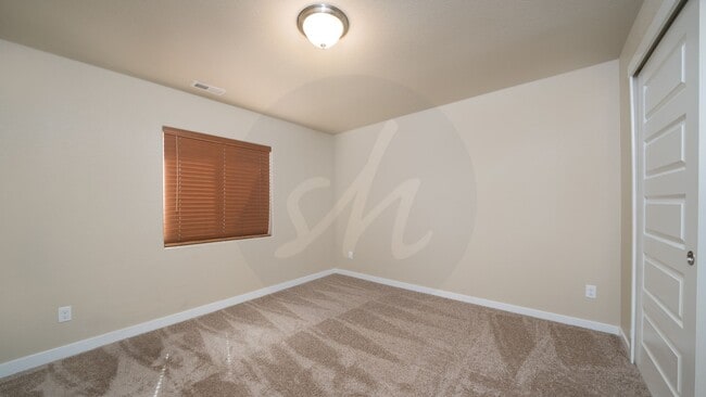 Building Photo - Immaculate Rancher in Spring Creek Neighbo...