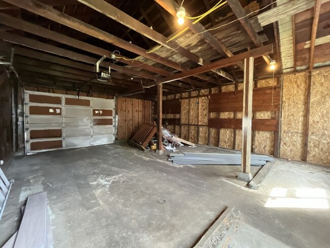 Building Photo - Expansive 4BR 2,900+ Sq Ft Home with Theater-Style Living Room & Bonus Hobby Workshop