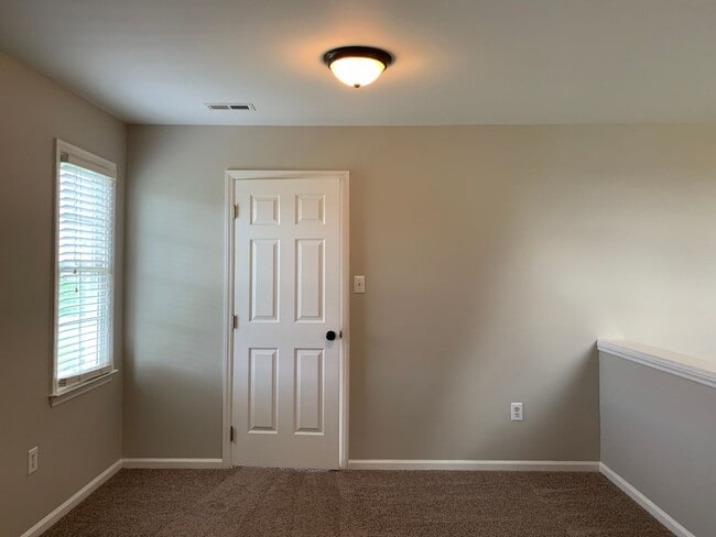 Building Photo - Pretty Home, Featuring 1st Floor Master Su...