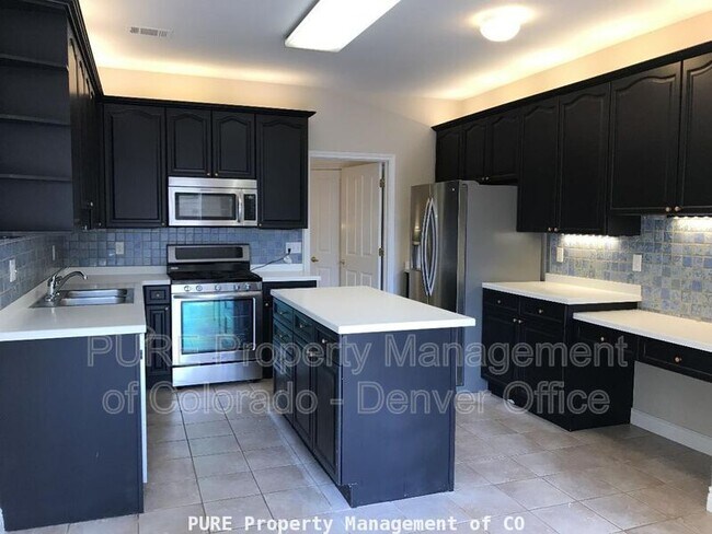 Building Photo - 9201 W Chatfield Pl